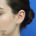 حلق ذهب عيار 18 شكل إنفينيتي مرصع فصوص – Alfady Gold | رمز الأناقة الدائمة