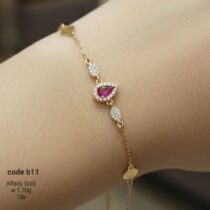 إنسيال ذهب عيار 18 مرصع بفص أحمر أنيق | كود B11