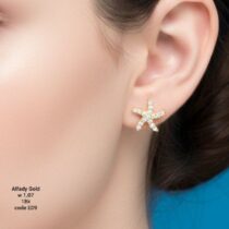 حلق ذهب عيار 18 بتصميم نجم البحر مرصع بالفصوص