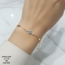 انسيال ذهب عيار 18 مرصع بحجر ملون وفصوص زركون