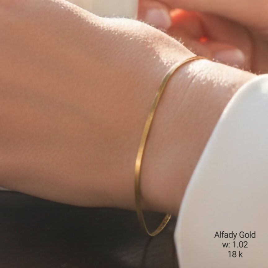 انسيال ذهب عيار 18 موديل "جلد الثعبان" المسطح | سوار كلاسيكي ناعم انسيال ذهب عيار 18 موديل "جلد الثعبان" المسطح | سوار كلاسيكي ناعم